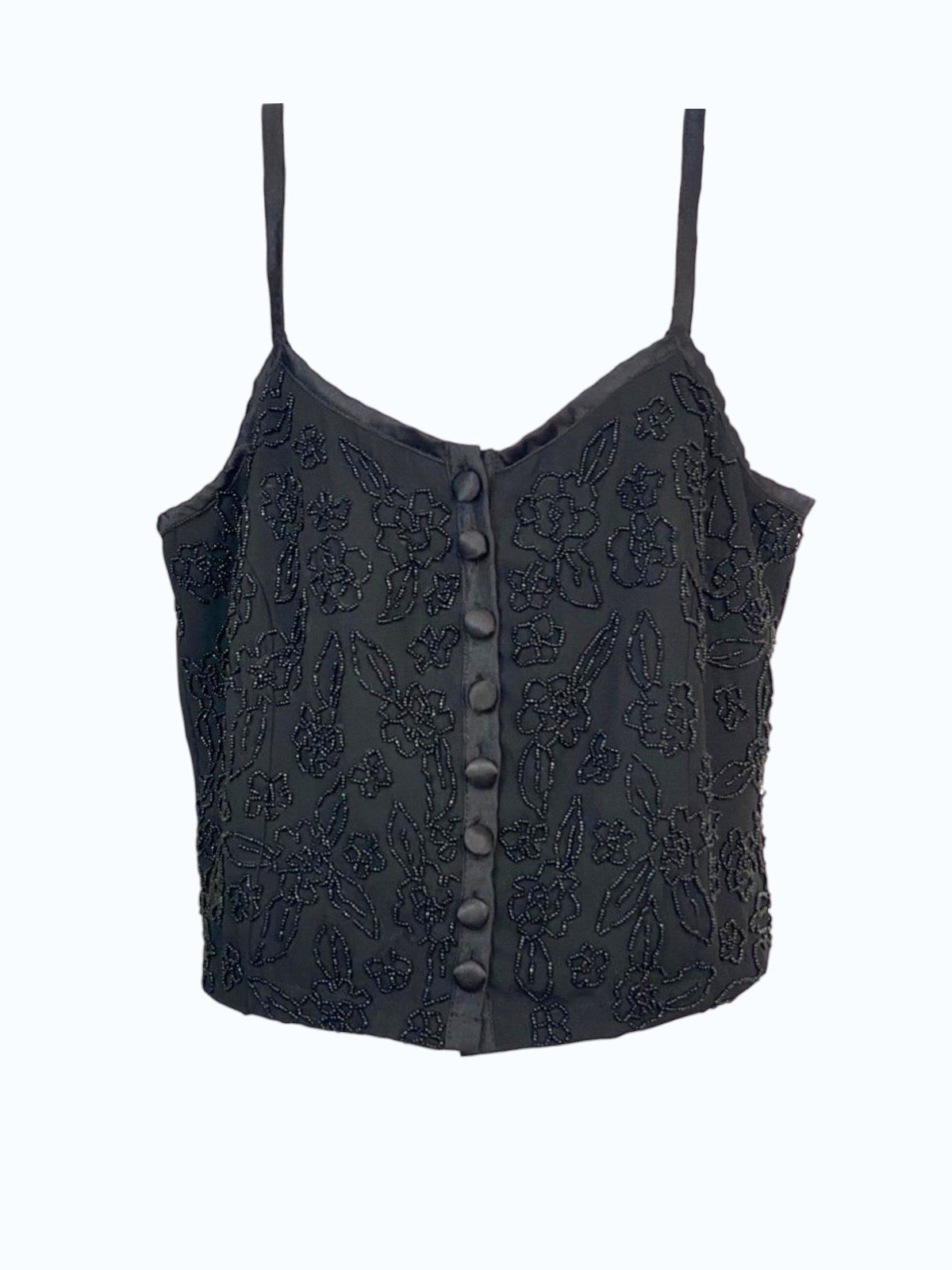 top nero con bottoncini e ricami a perline